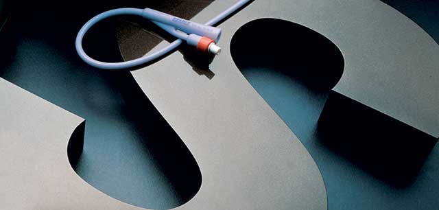 G.D. Searle & Co. close-up of metal letter s